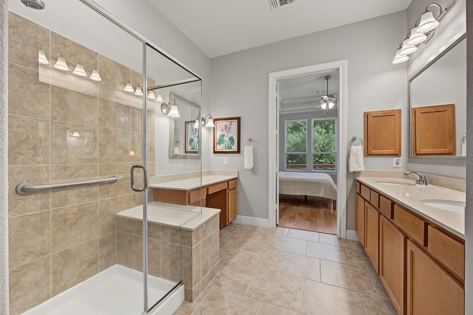 229 Percheron Drive, Spring, TX 77382 Larger shower with seating bench and safety rail inside.