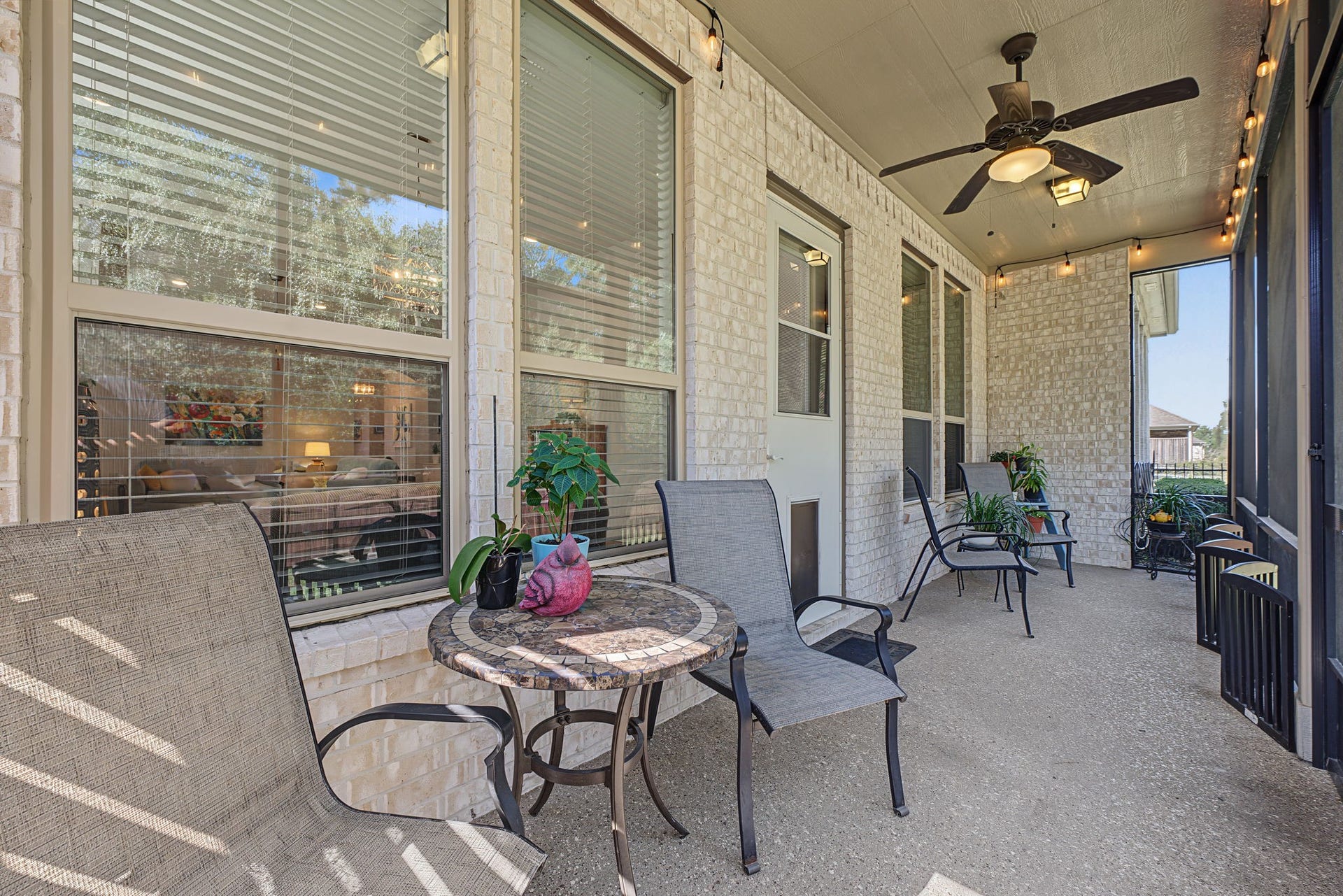 229 Percheron Drive, Spring, TX 77382 View from other corner of the back patio. The patio flooring is an epoxy-like surface on top of the concrete.