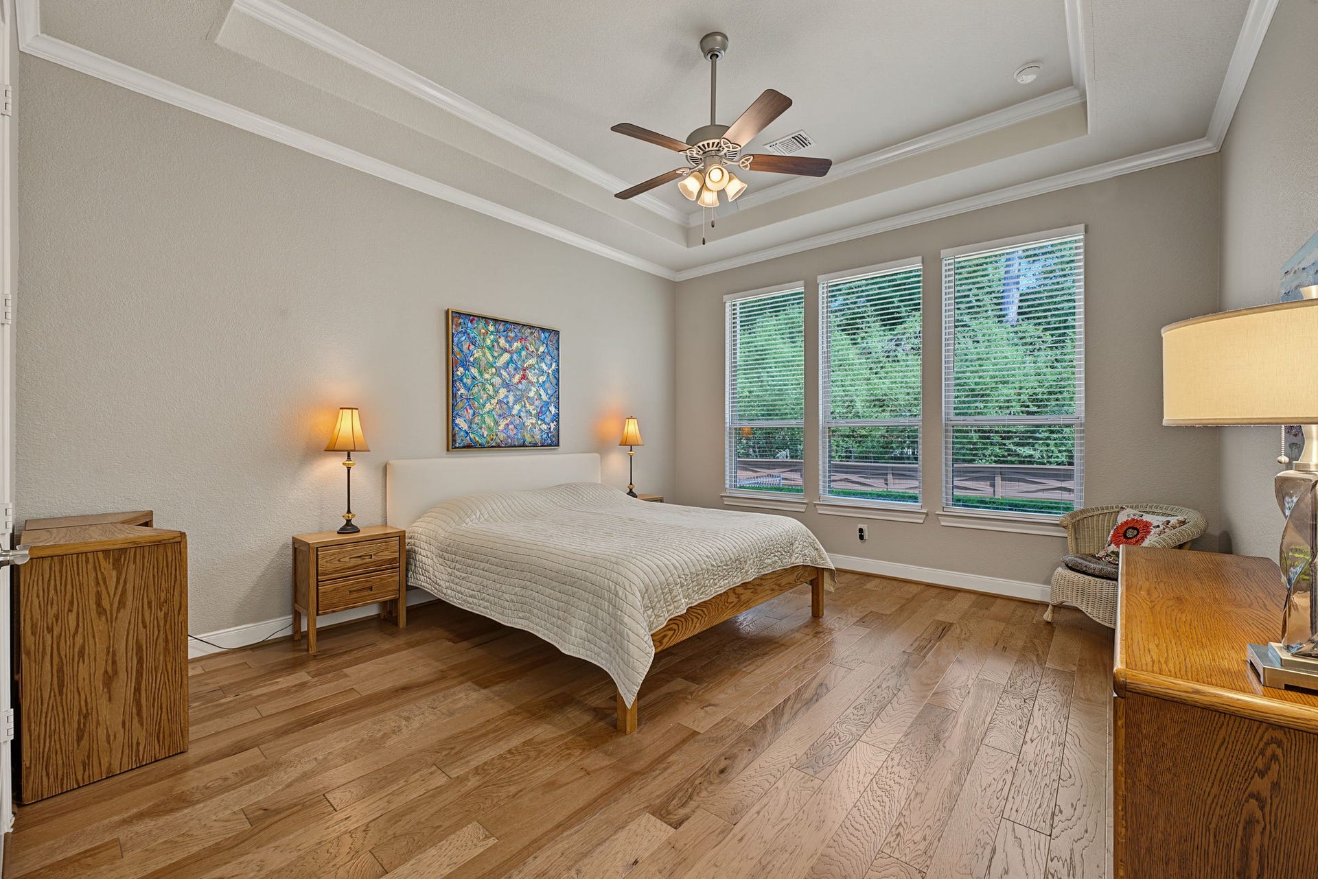 229 Percheron Drive, Spring, TX 77382 The Primary Bedroom looks out to the tree preserve and backyard. Tray ceilings with double crown molding.