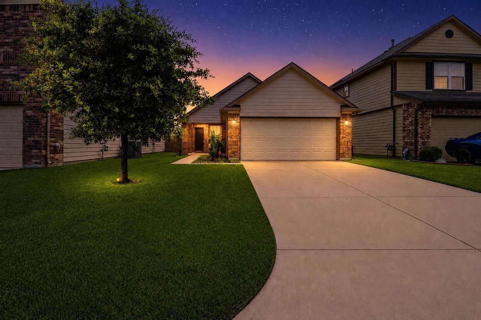 12710 City Green Trail, Houston, TX 77044 Charming single-story home with a well-maintained lawn and illuminated walkway. Features a spacious driveway leading to a two-car garage. Ideal for comfortable living in a peaceful neighborhood setting.