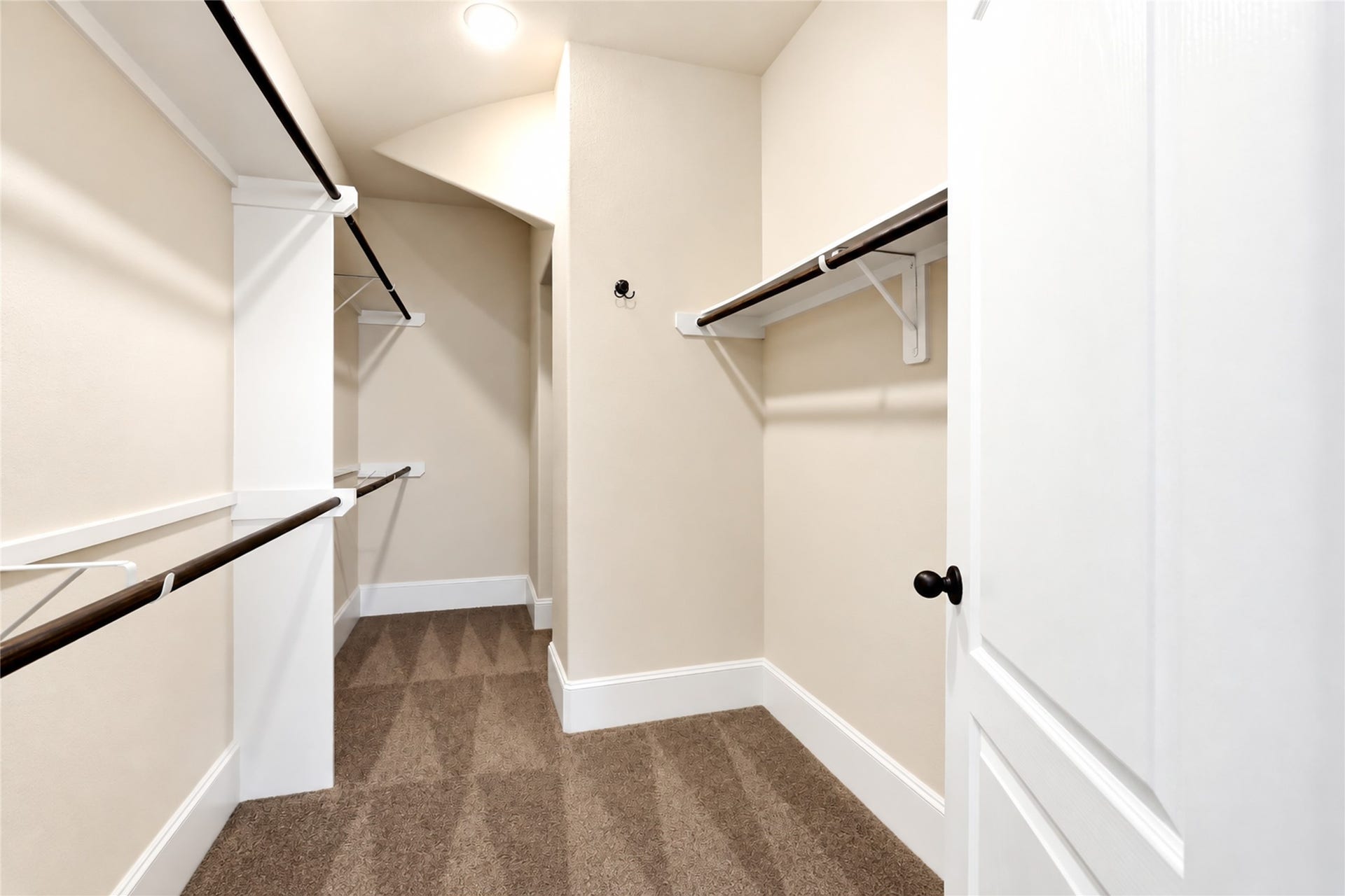 Spacious walk in closet with extra storage space!