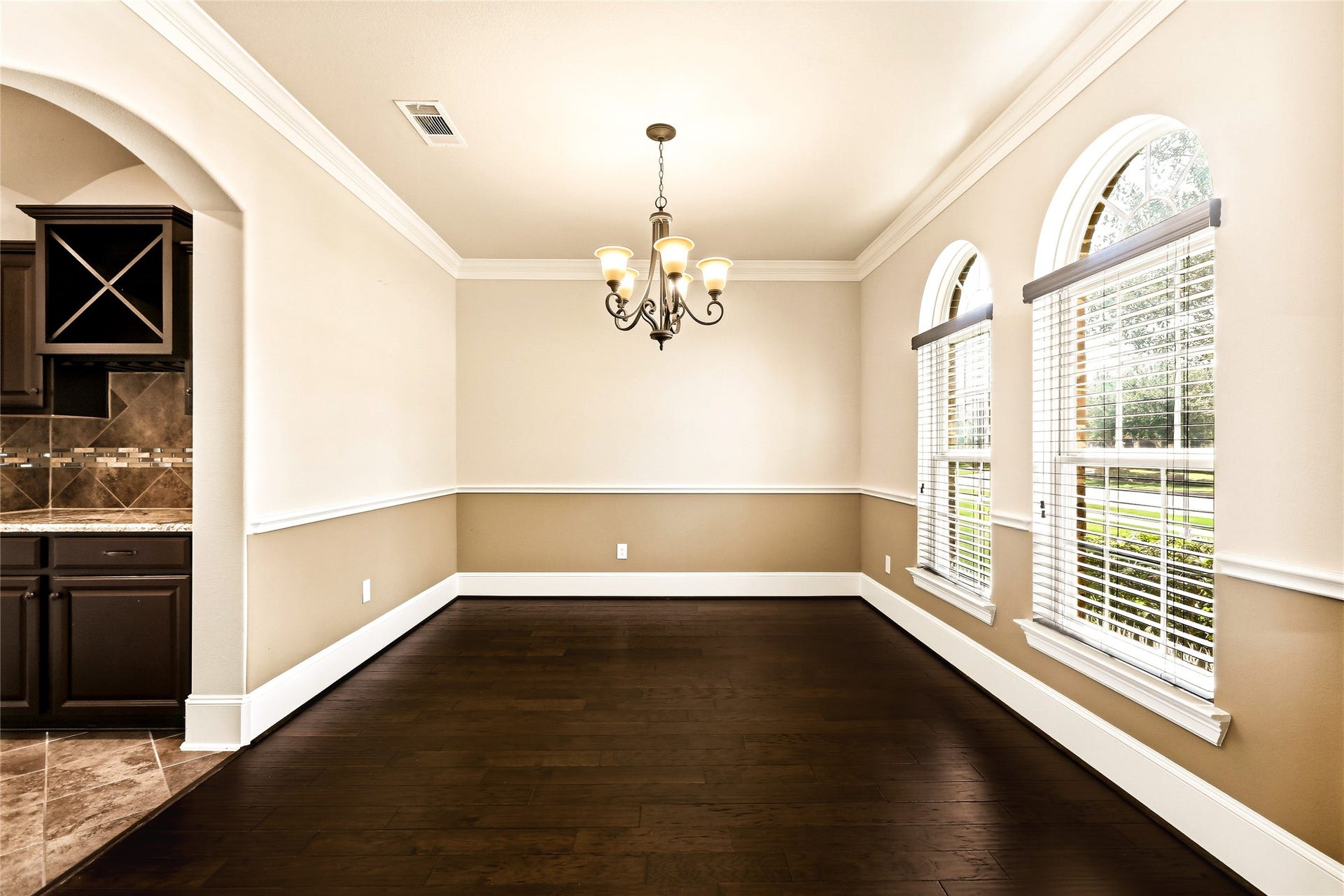 Formal dining or flex space for office located at the front of the house