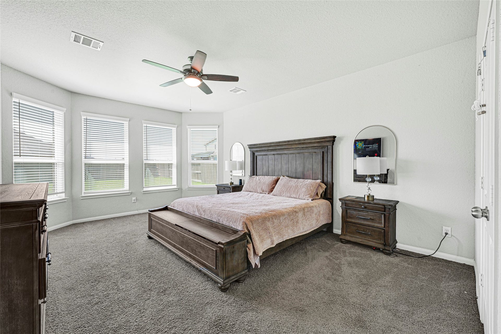 Spacious Primary Bedroom with Bay Windows