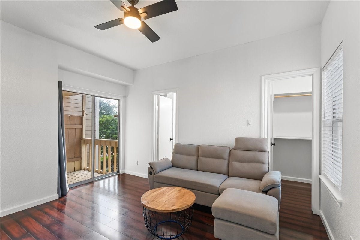 Primary bedroom with private access to balcony, two closets and an en-suite bathroom.