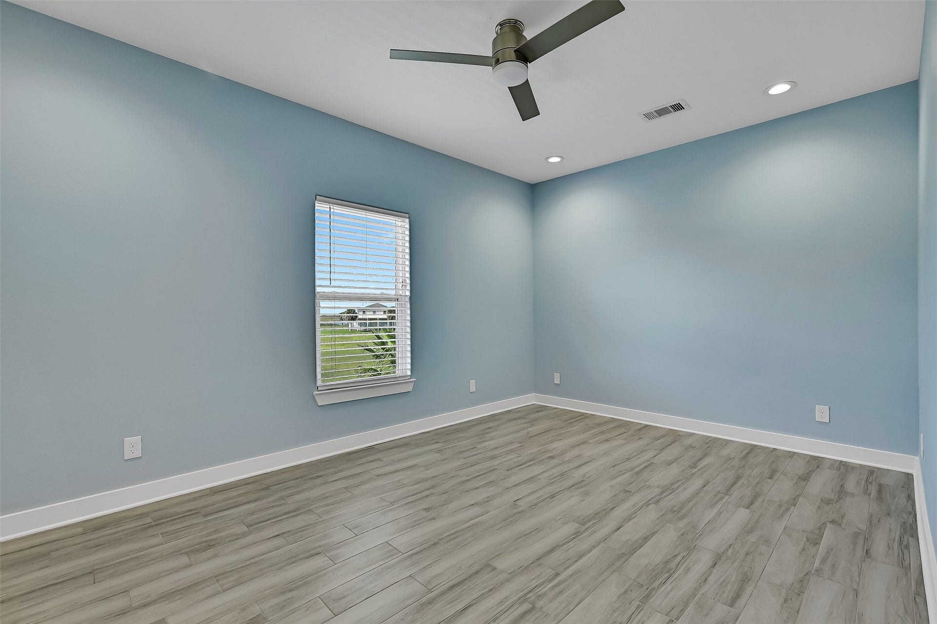 3911 Warrior Court, Galveston, TX 77554 The first guest bedroom offers a spacious closet.