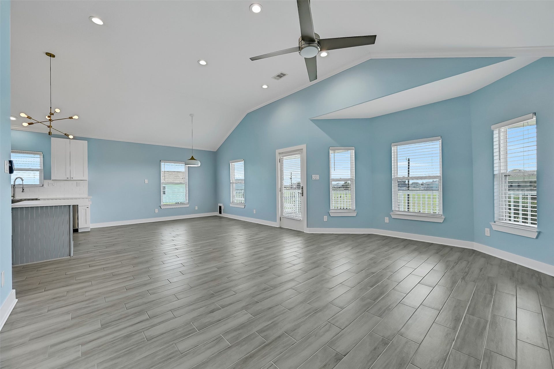 3911 Warrior Court, Galveston, TX 77554 The open floor plan makes entertaining easy and creates a seamless flow throughout the main living space.