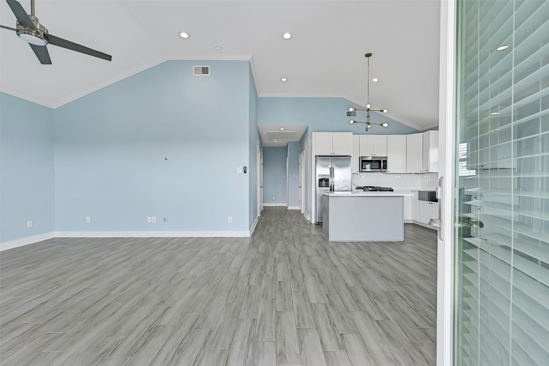 3911 Warrior Court, Galveston, TX 77554 As you set inside you will be welcomed into living room filled with natural light.