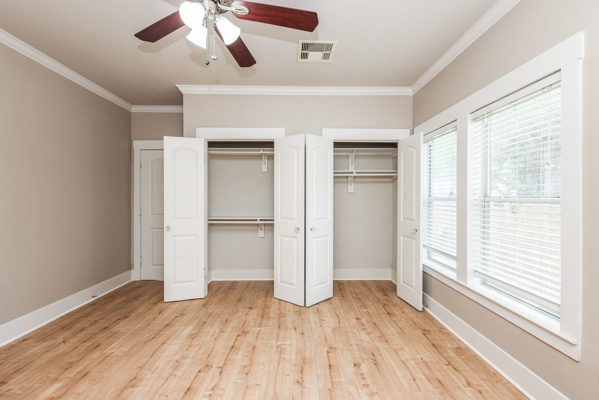 1307 Walton Street, Houston, TX 77009 Primary bedroom featuring two built-in closets for ample storage.