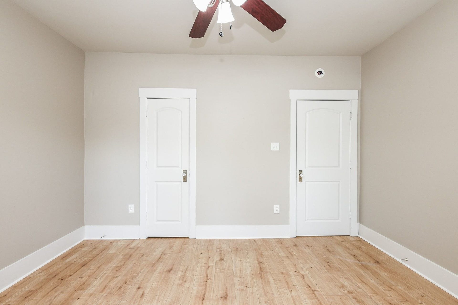 1307 Walton Street, Houston, TX 77009 Bedroom with closet and ceiling fan.