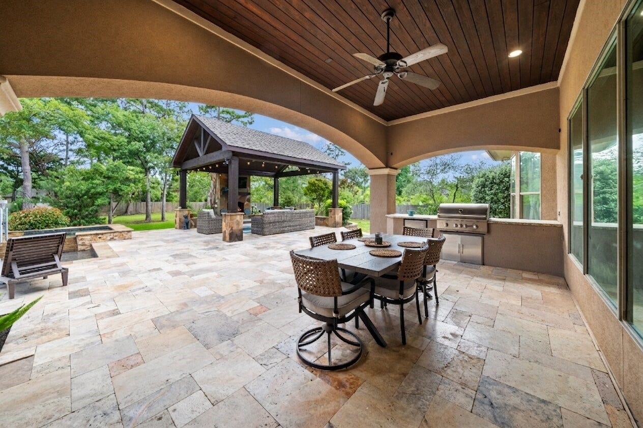 4426 Silver Jade Drive, Spring, TX 77386 Accentuated by a gorgeous wood-paneled ceiling and an abundance of decking, its a stunning setup ready for massive gatherings.