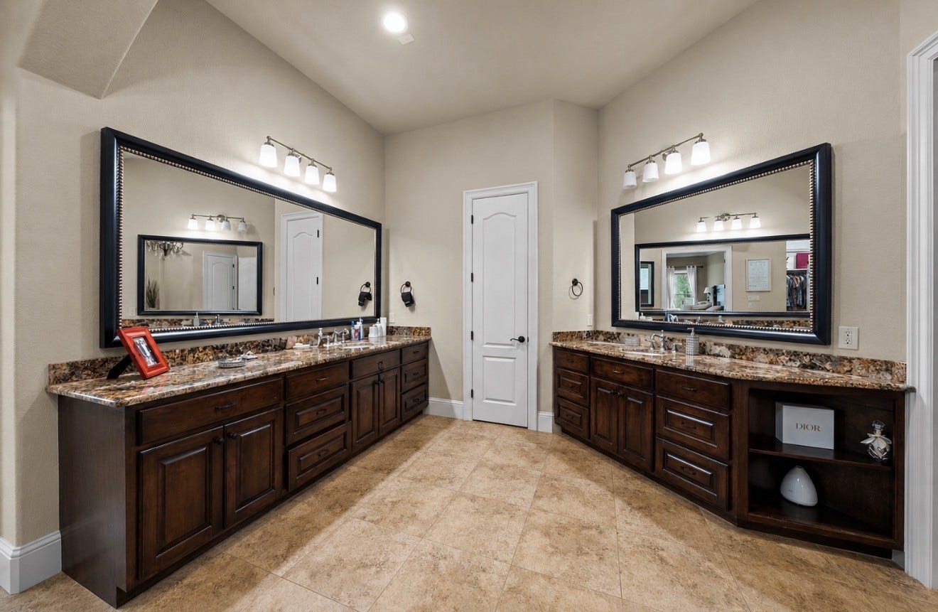 4426 Silver Jade Drive, Spring, TX 77386 A sanctuary of personal space. This magnificent primary bath banishes compromise, offering beautifully appointed, individual dual wings so each partner enjoys an uncompromised, private enclave to begin and end the day.
