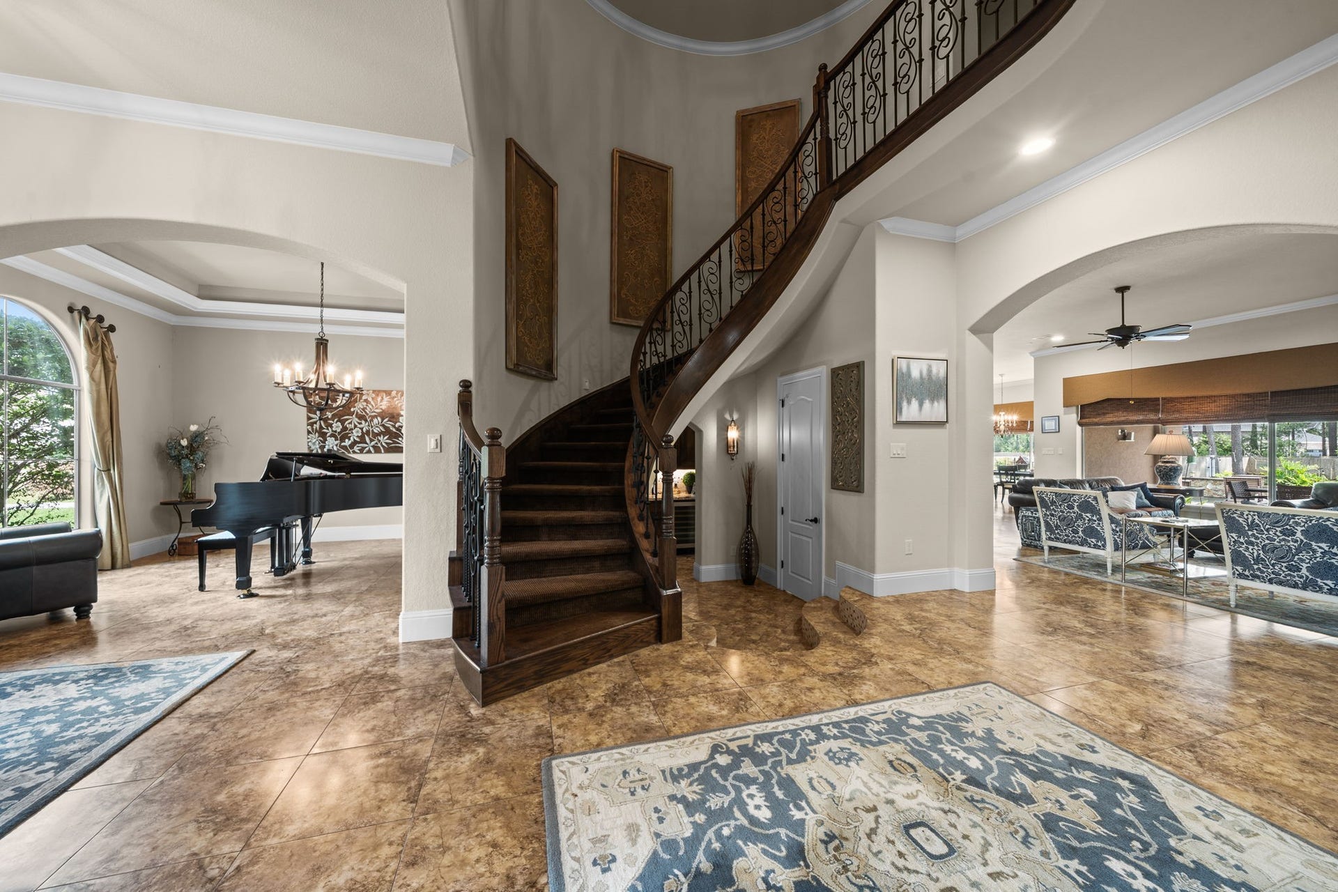 4426 Silver Jade Drive, Spring, TX 77386 Designed for those with an appreciation for architectural artistry. From the second you step through the door, you are enveloped in bespoke detail and unmatched character, anchored by this striking, unforgettable foyer view.