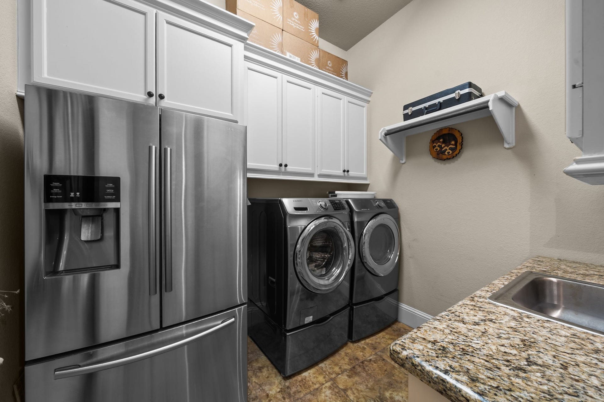 4426 Silver Jade Drive, Spring, TX 77386 Even the laundry room feels high-end. Loaded with cabinets, a built-in sink with counter space, and dedicated room for a large secondary refrigerator.