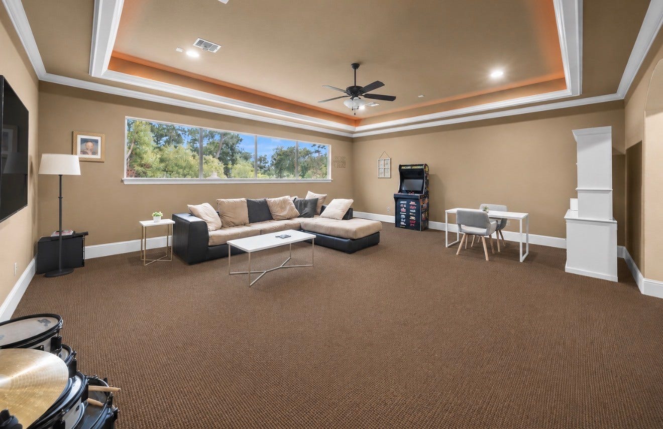 4426 Silver Jade Drive, Spring, TX 77386 A sprawling upper-level retreat of infinite possibilities. Whether curated as a high-end billiard salon, a plush media lounge with a large sectional, or a premium gaming gallery, this oversized entertainment space is a masterclass in versatile, high-end design.