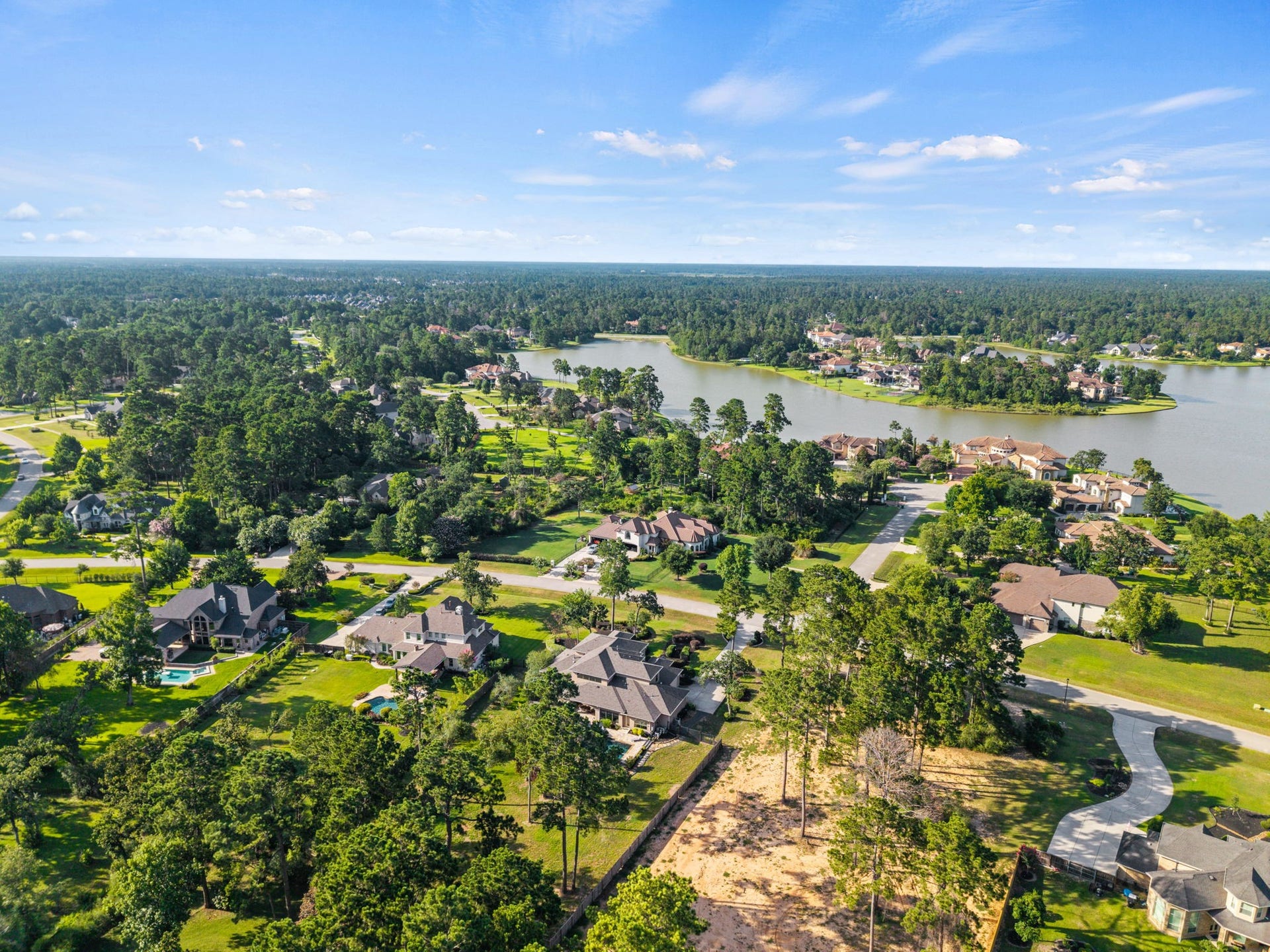 4426 Silver Jade Drive, Spring, TX 77386 Positioned perfectly within the neighborhood, this property sits directly across from the community's premier and largest lake.