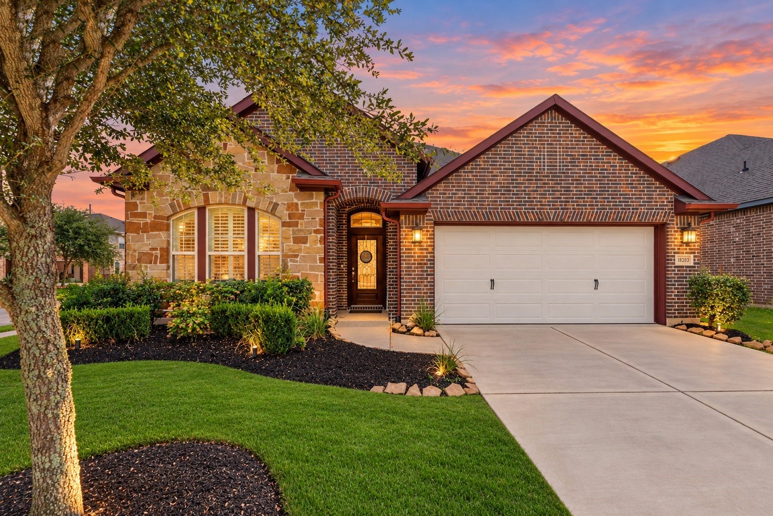 18203 Burnett Willow Lane, Cypress, TX 77433 Charming brick and stone home with curb appeal.