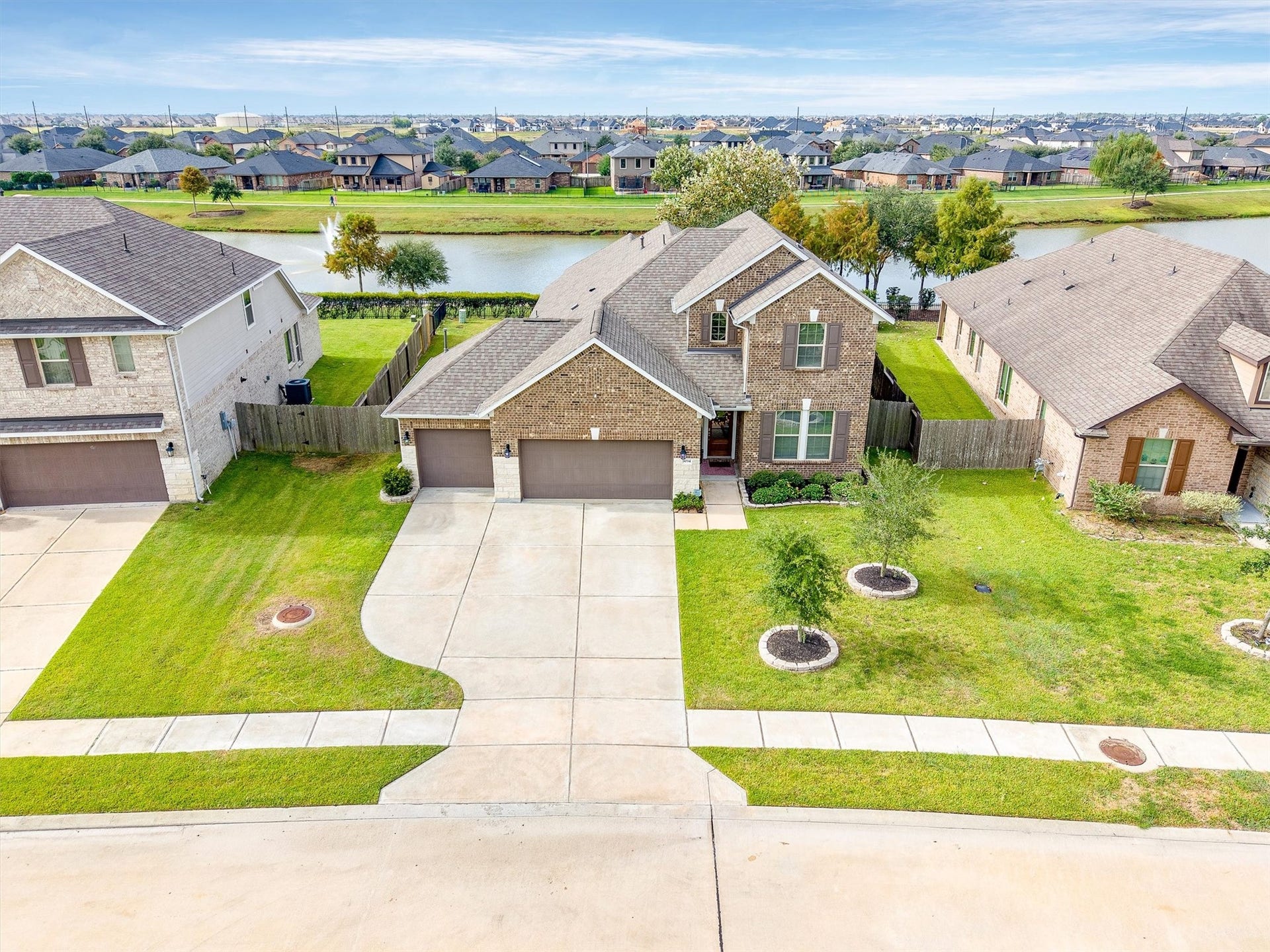 9034 Japonica Drive, Rosenberg, TX 77469 Elevated living in every sense of the word. Check out this gorgeous elevation!