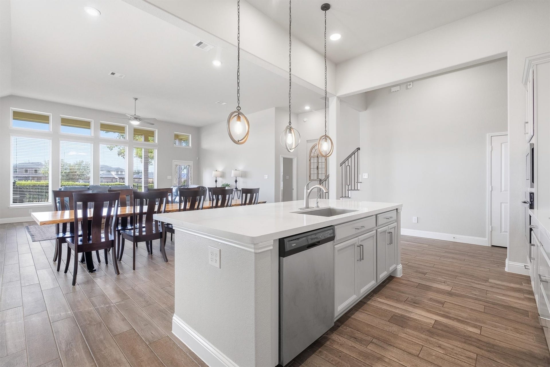 9034 Japonica Drive, Rosenberg, TX 77469 Entertainer's paradise! This expansive open-concept layout flows seamlessly from a beautifully appointed chef's kitchen to a massive dining space.