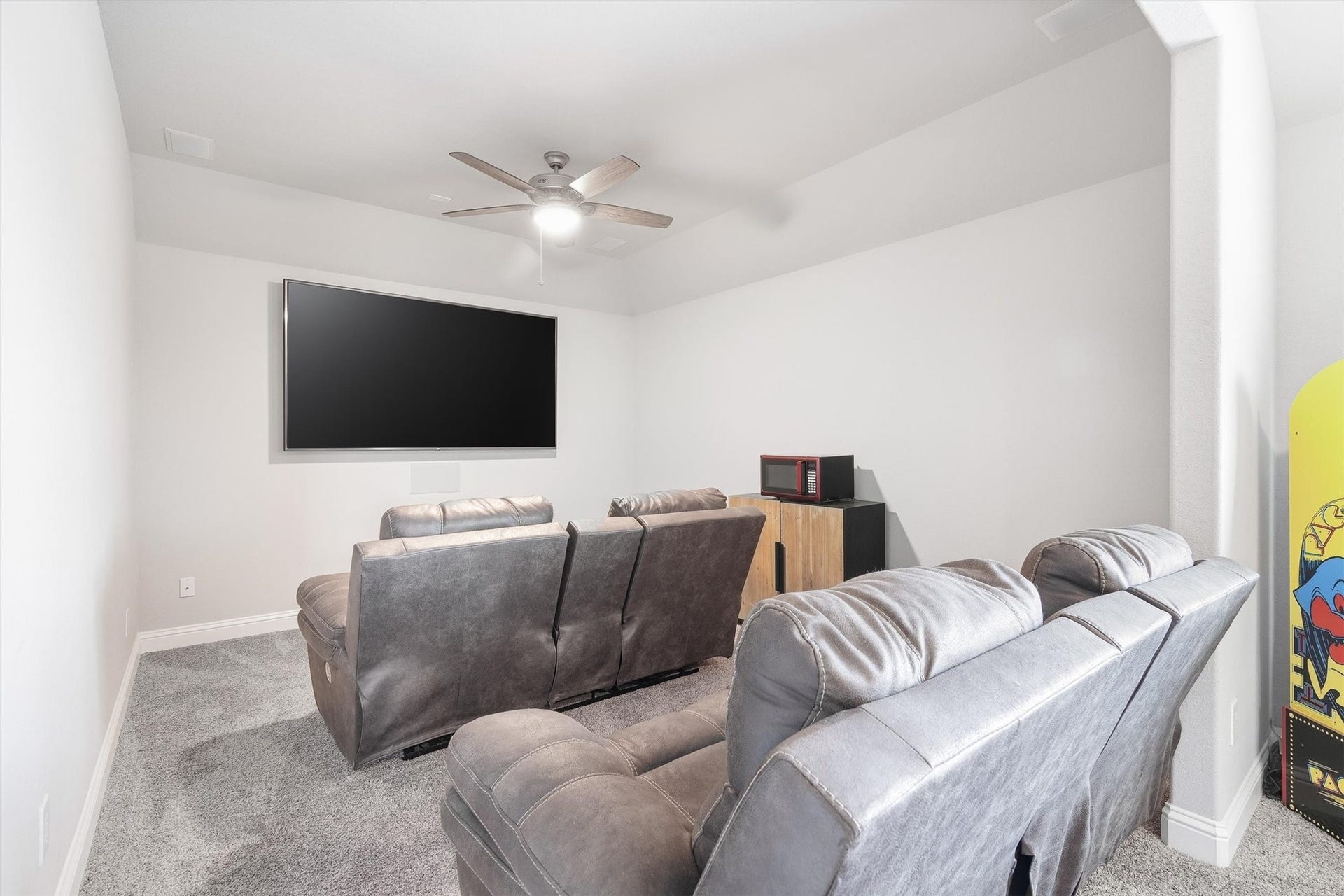 9034 Japonica Drive, Rosenberg, TX 77469 Why pick between arcade night and movie night when you can do both?