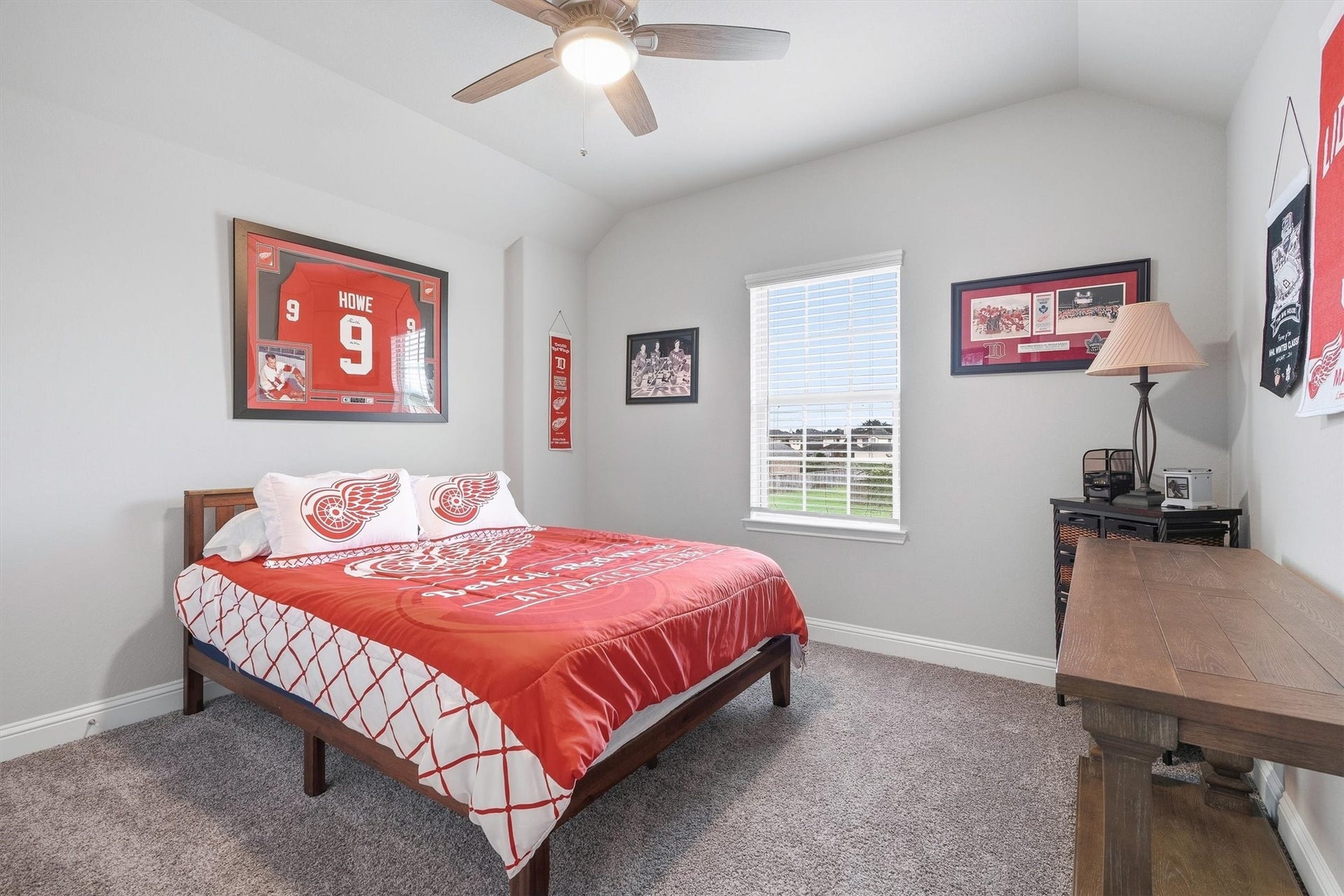 9034 Japonica Drive, Rosenberg, TX 77469 Upstairs bedroom #3 features vaulted ceilings and great natural light.