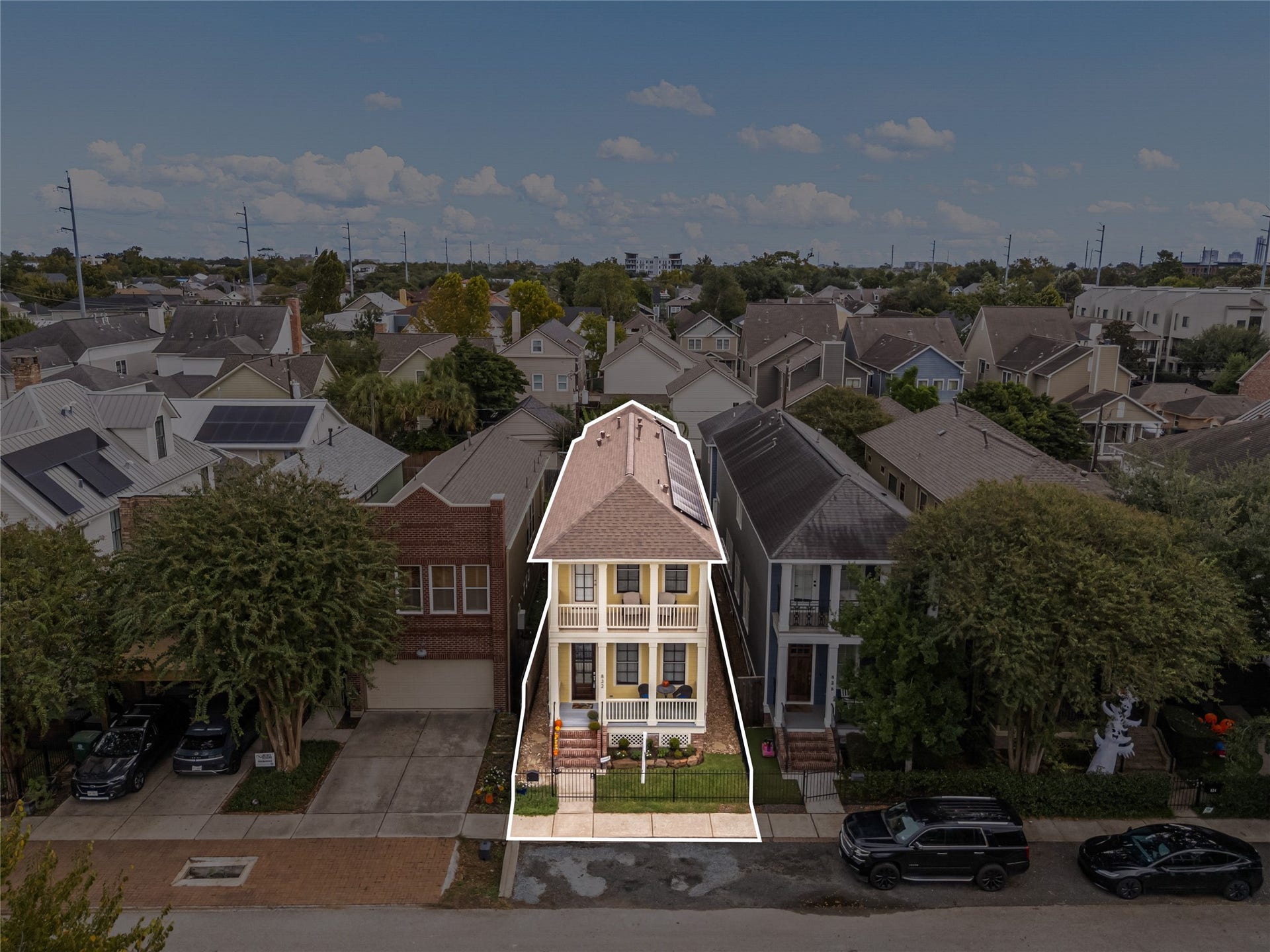 Aerial perspective highlights the home's distinctive architecture, Nicholson Street location & surrounding Heights neighborhood.