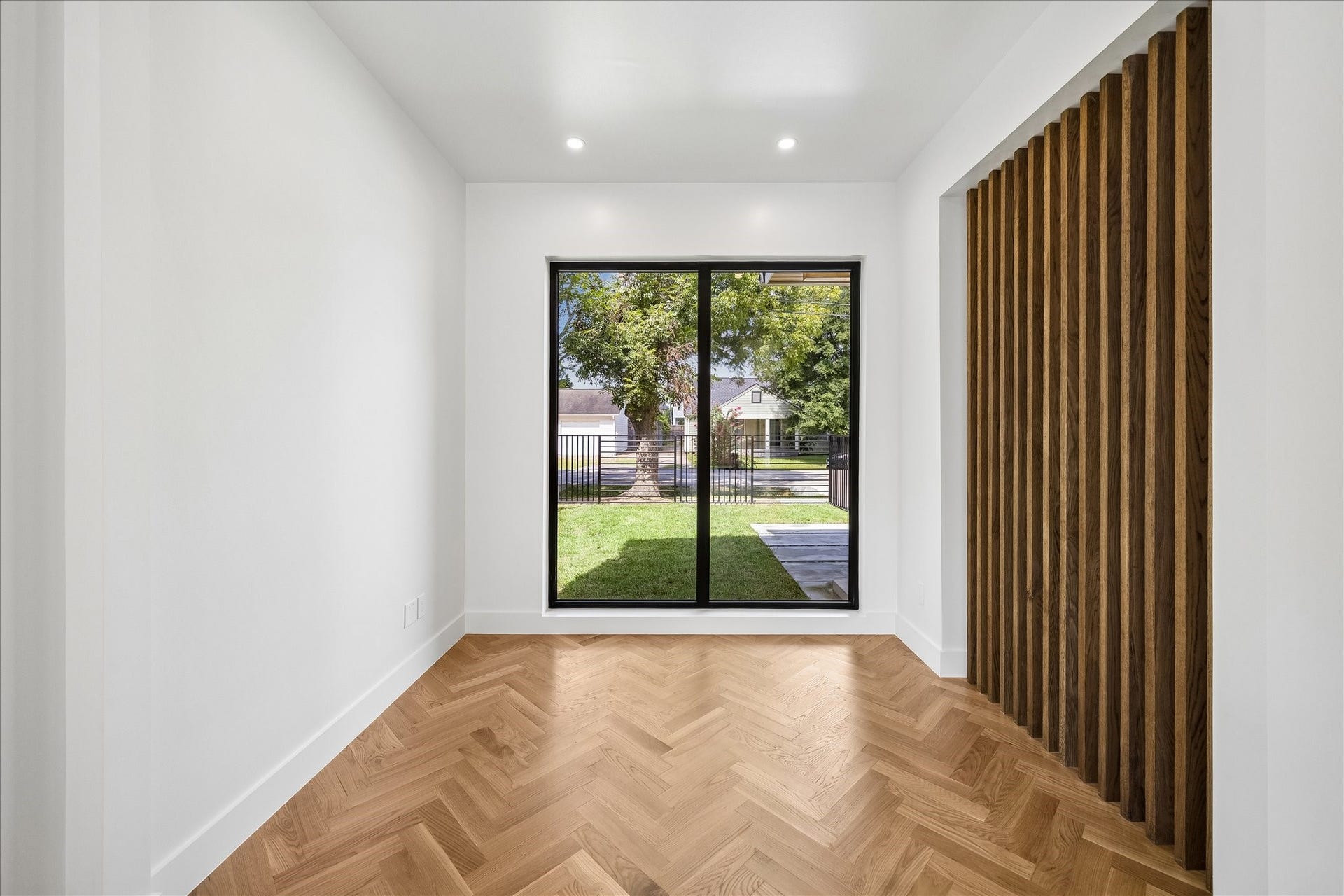 The open layout seamlessly connects to a chic dining area, perfect for entertaining.