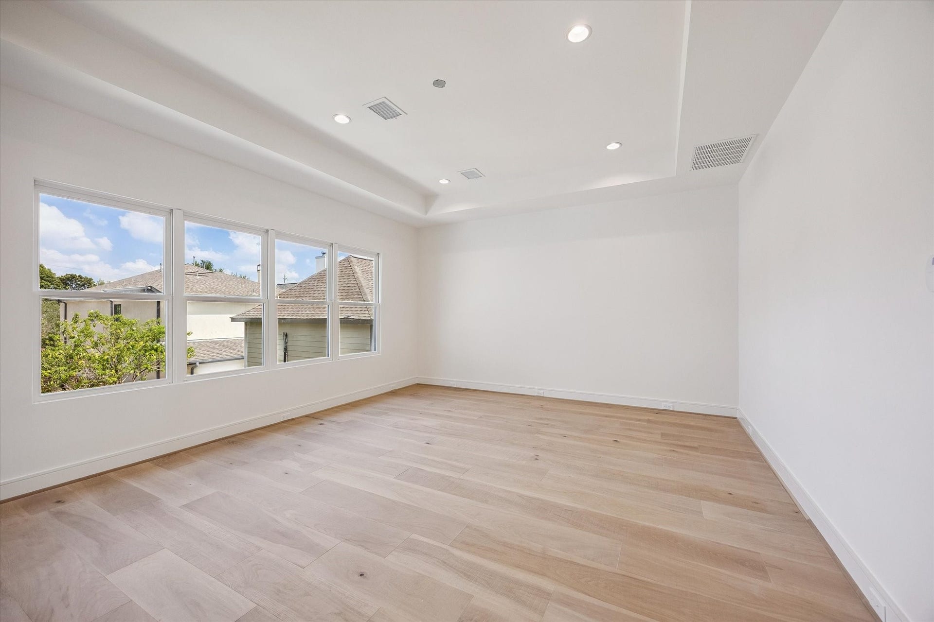 Expansive primary suite overlooks back yard.  Decorative lighting not yet installed.