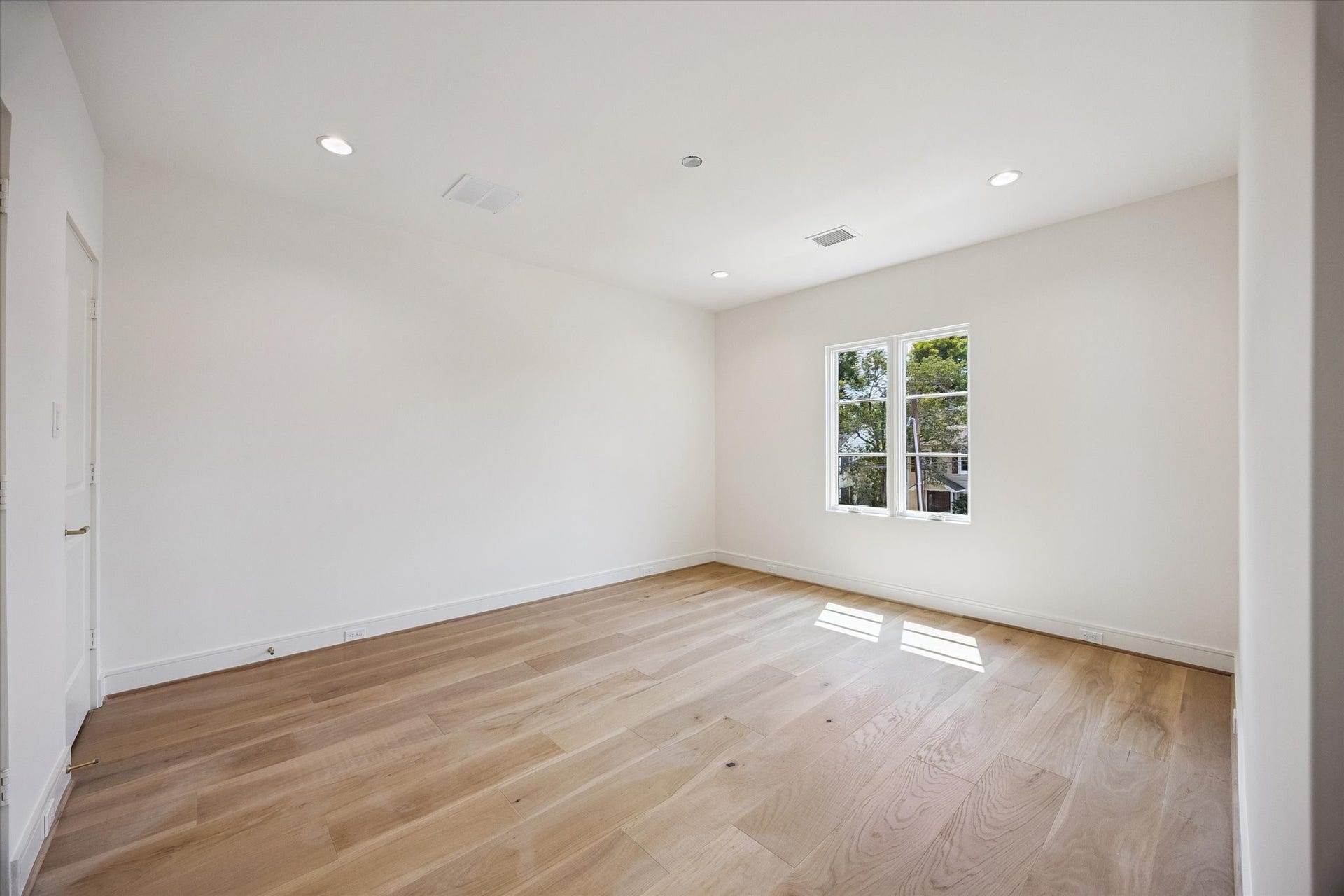 One of four secondary bedrooms.  Ceiling fans not yet installed.
