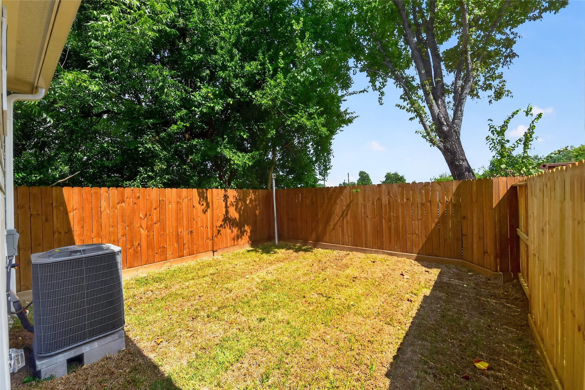 Private, spacious, and secure -- enjoy a fully enclosed backyard designed for year-round outdoor comfort.