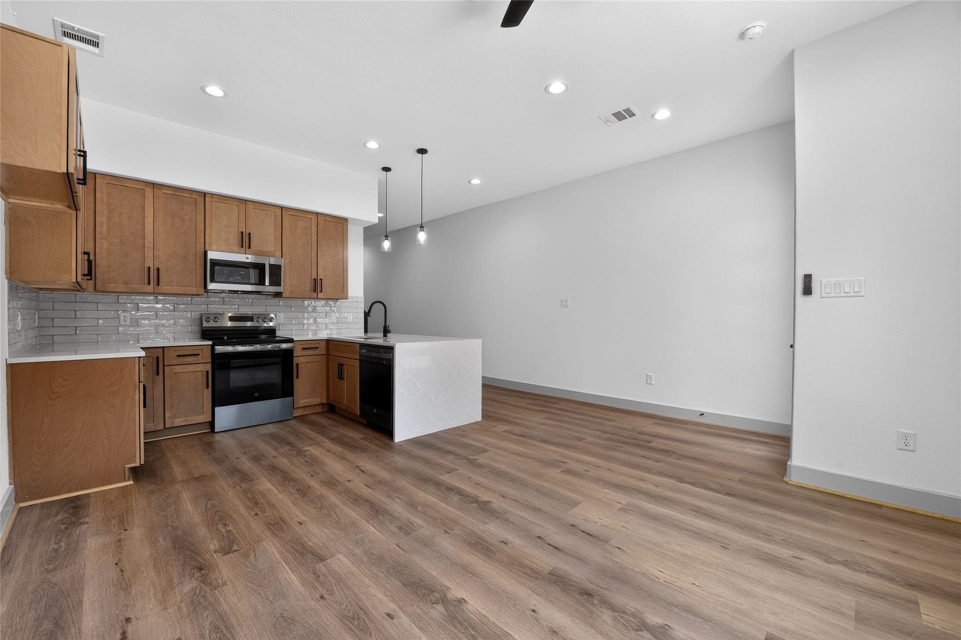 Designed for modern flowan expansive, light-filled first level where cooking, dining, and relaxing co-exist in perfect balance.