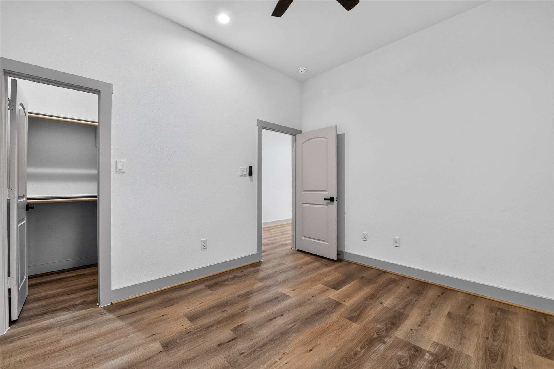 Year-round comfort--the home includes a ceiling fan, a standard feature in every bedroom.