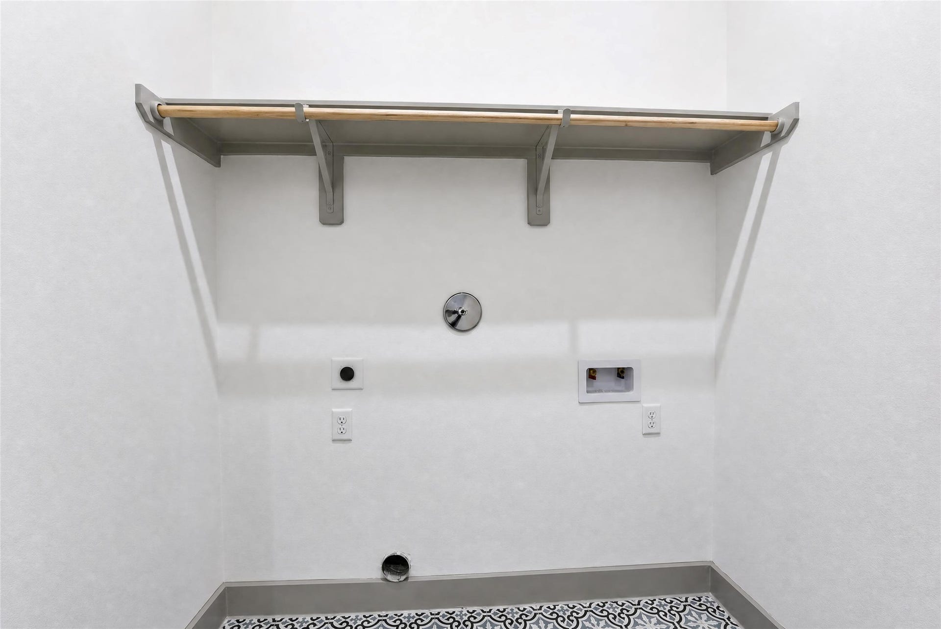 Streamlined utility space features ready-to-use washer/dryer connections fully prepared for your custom gas or electric appliances and extra storage capacity.