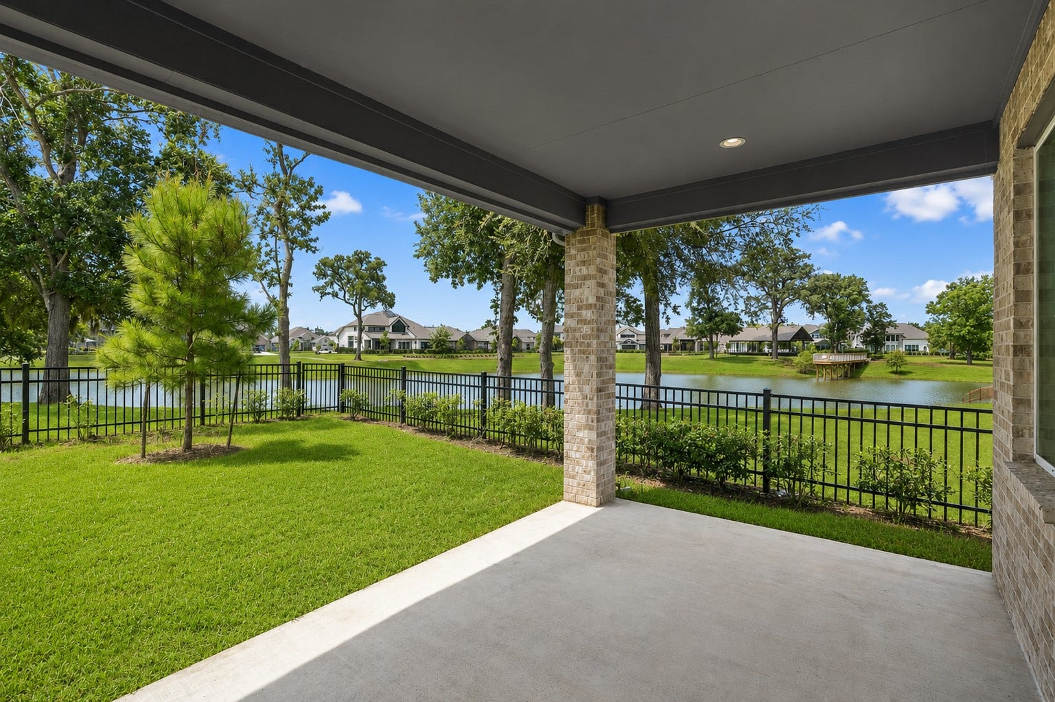 Rather than a wood fence that confines, imagine sitting out here in the shade hosting a Texas BBQ entertaining family and friends with near total privacy, where stunning views and colorful sunsets reflecting off the water whet the appetite, while at the same time, your attention is drawn to watching a flock of geese swoop down on the water.