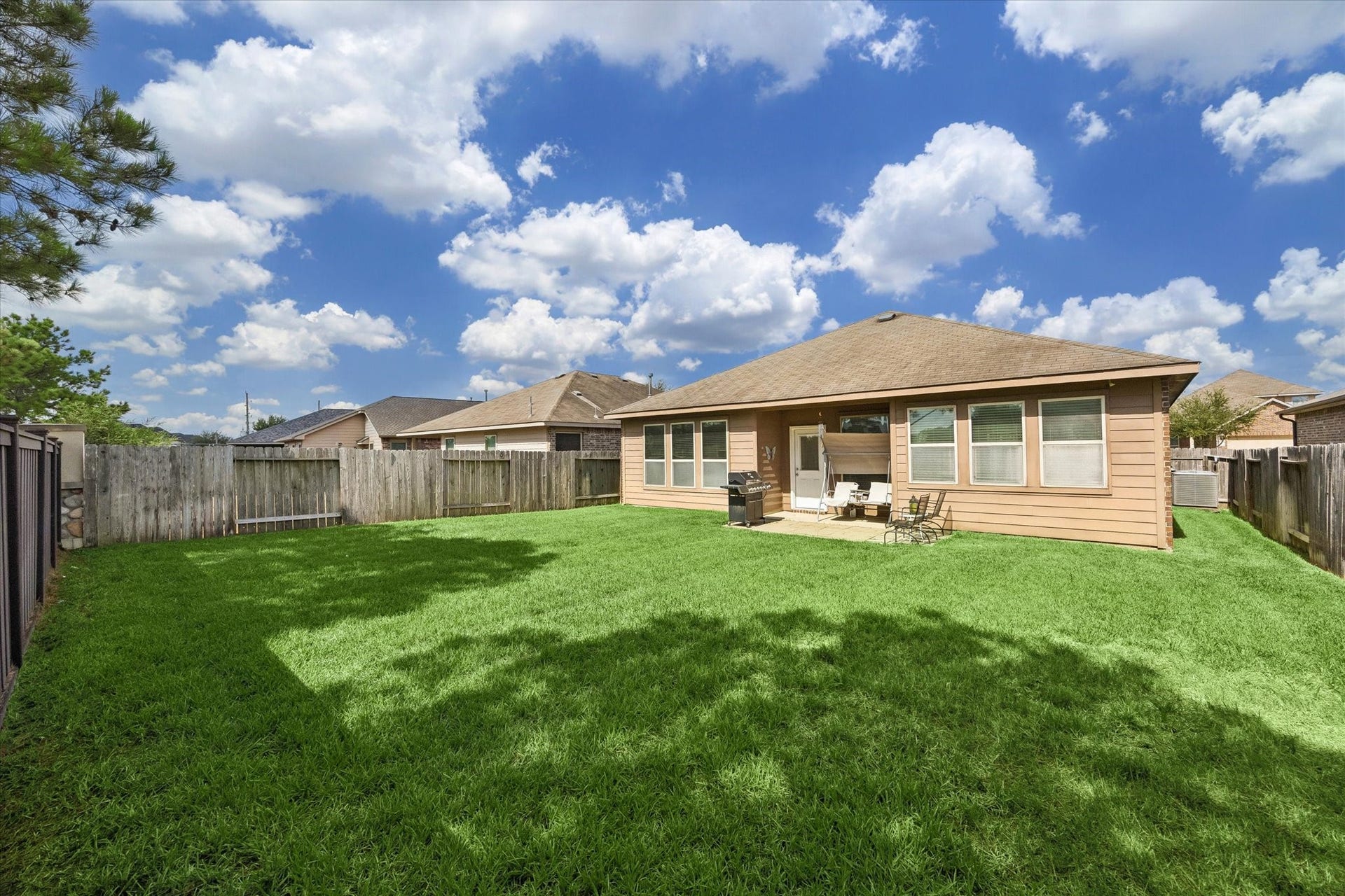 Large yard with covered patio and no rear neighbors!