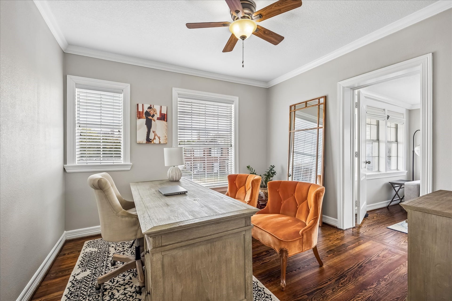 1909 Rosewood Street, Houston, TX 77004 Upstairs bedroom is currently styled as a home office, with multiple windows and a comfortable footprint for a dedicated workspace.