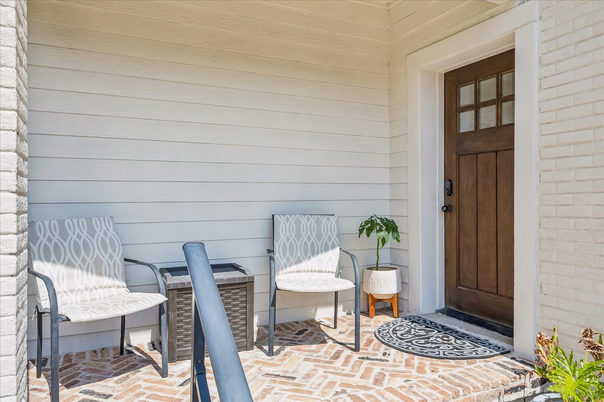 1909 Rosewood Street, Houston, TX 77004 Covered porch is finished with brick detailing completed in 2019, creating a comfortable place to sit just outside the home.