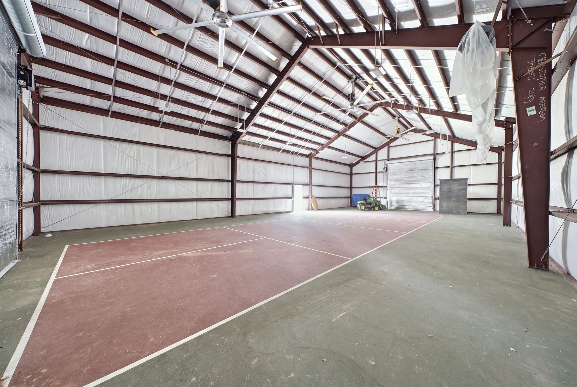 Spacious shop features a pickleball court!