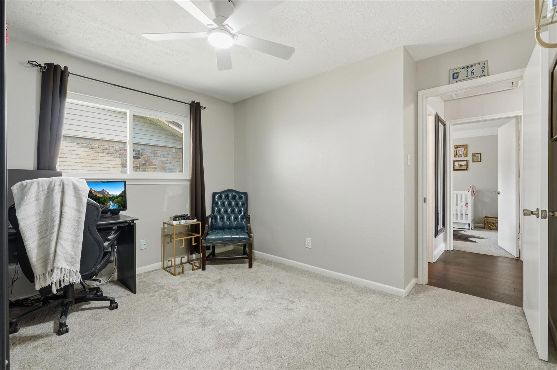 12919 Westhorpe Drive, Houston, TX 77077 Bedroom number 3 of the 3 secondary bedrooms. Prior to converting to an additional office space, this room easily fit a queen bed!