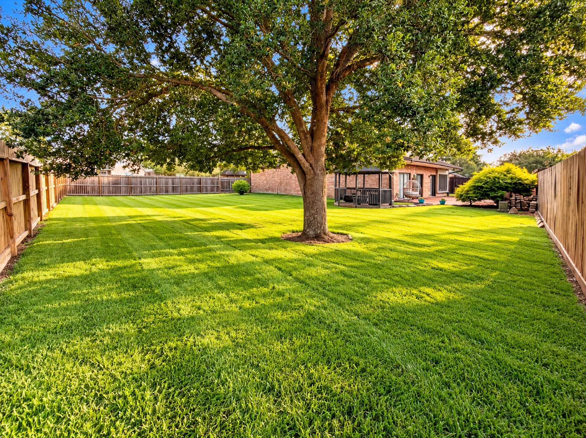 3902 Crystal Falls Drive, Missouri City, TX 77459 Expansive backyard with beautifully manicured lawn, mature shade tree, privacy fencing, and plenty of space for outdoor activities or future landscaping.
*Virtually enhanced photo