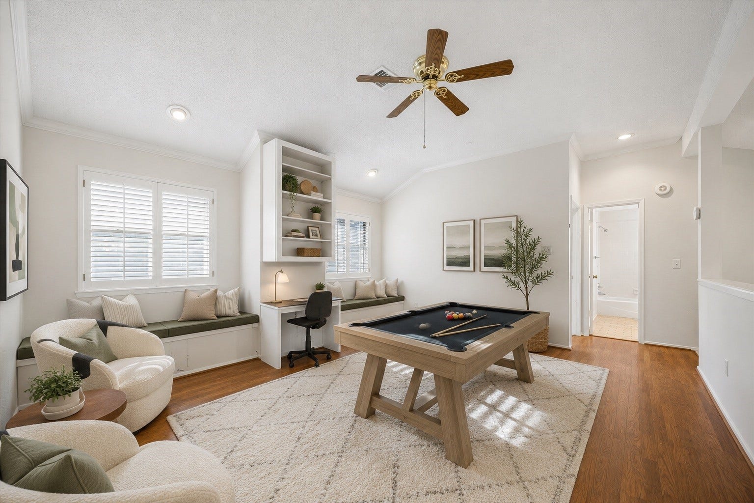 3902 Crystal Falls Drive, Missouri City, TX 77459 Large upstairs game room ideal for movie nights, games, or a home office. *Virtually staged photo of the 2nd floor game room*