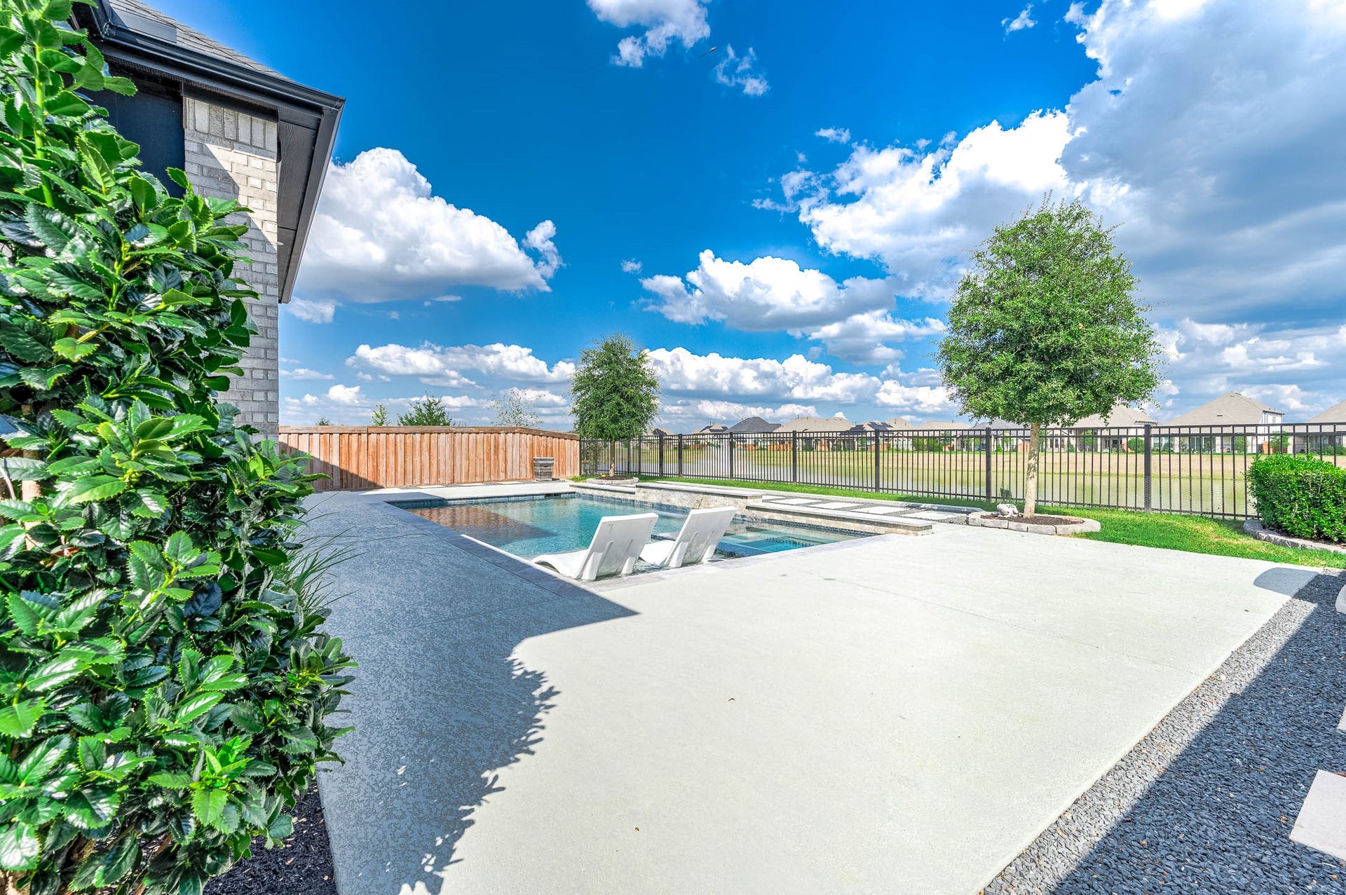 13802 Arroyo Grande Drive, Cypress, TX 77433 Spacious pool deck with plenty of room for lounging and entertaining.