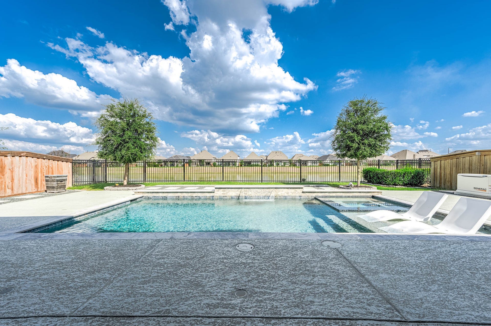 13802 Arroyo Grande Drive, Cypress, TX 77433 Gorgeous private pool and spa overlooking the peaceful waterfront setting.