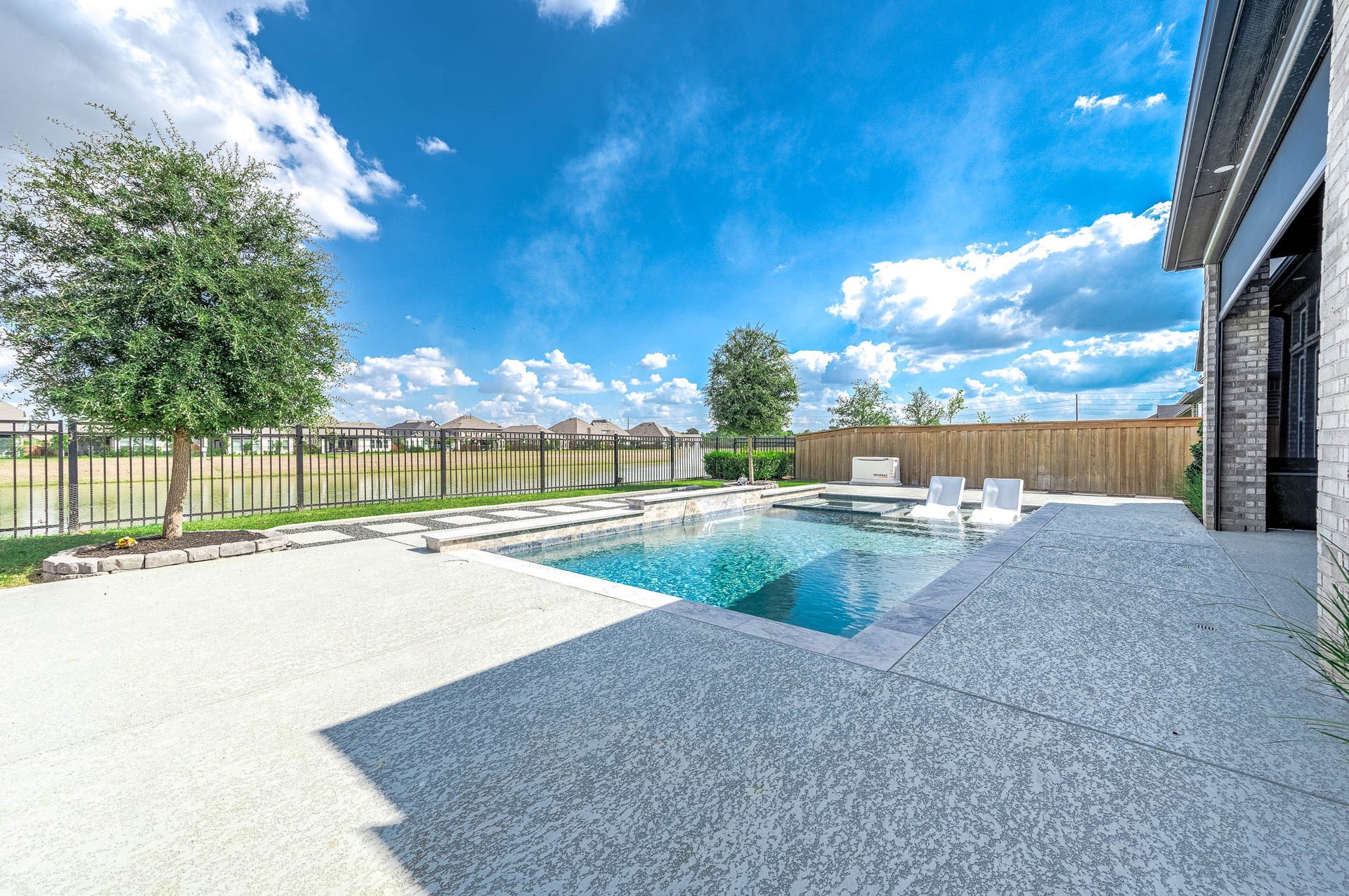 13802 Arroyo Grande Drive, Cypress, TX 77433 Spacious outdoor living area with beautiful views of the surrounding landscape.