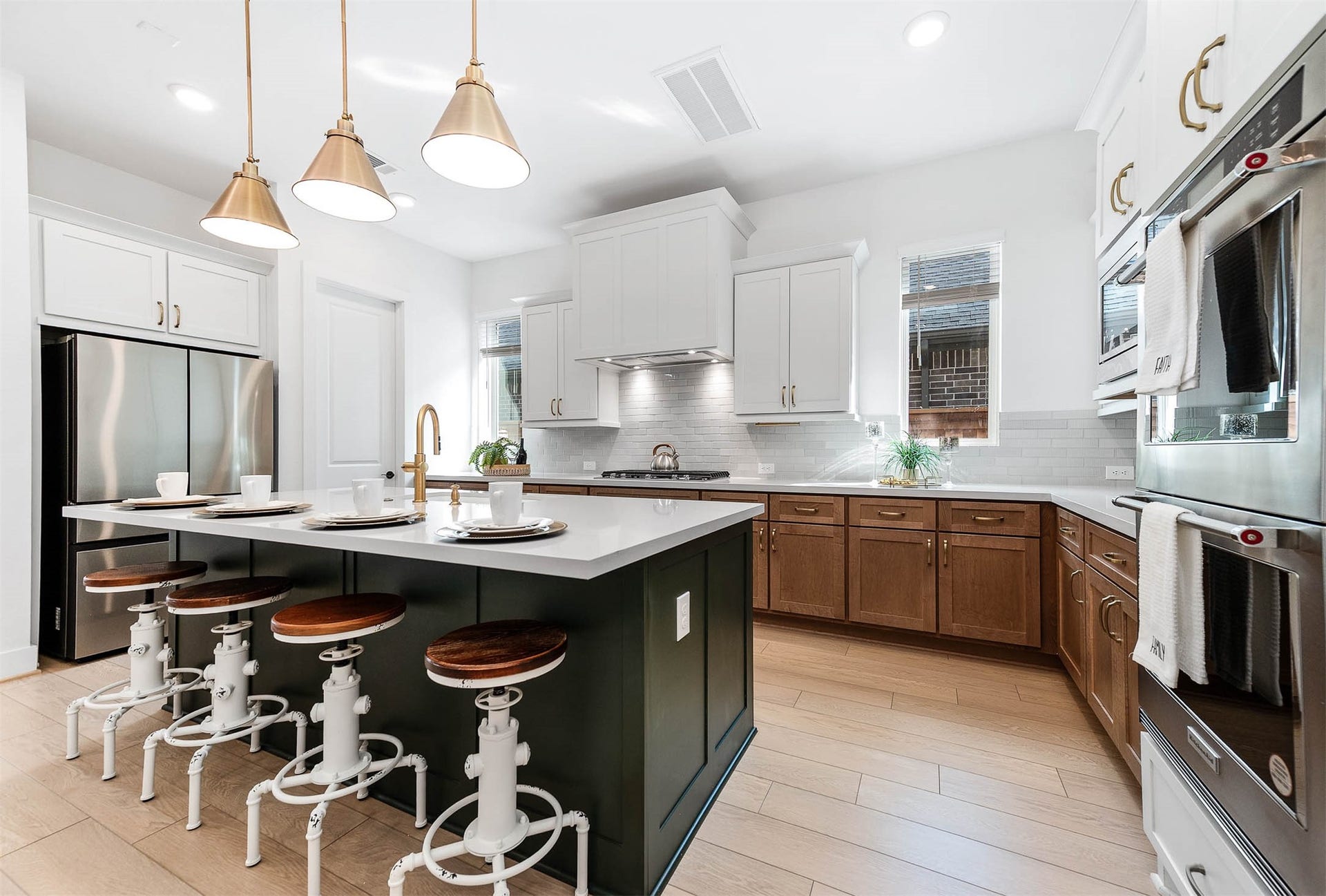 13802 Arroyo Grande Drive, Cypress, TX 77433 Gourmet kitchen featuring an oversized island, premium cabinetry, and elegant finishes.