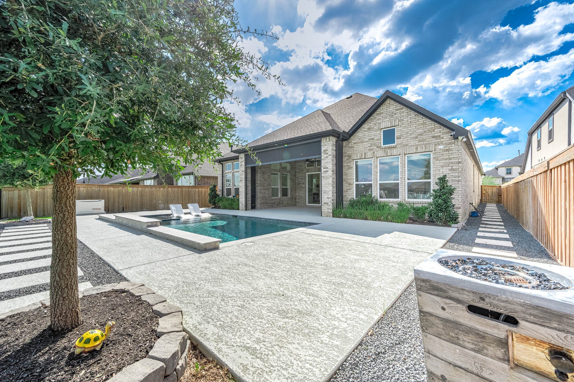 13802 Arroyo Grande Drive, Cypress, TX 77433 Beautiful backyard retreat featuring a sparkling pool and attached spa.