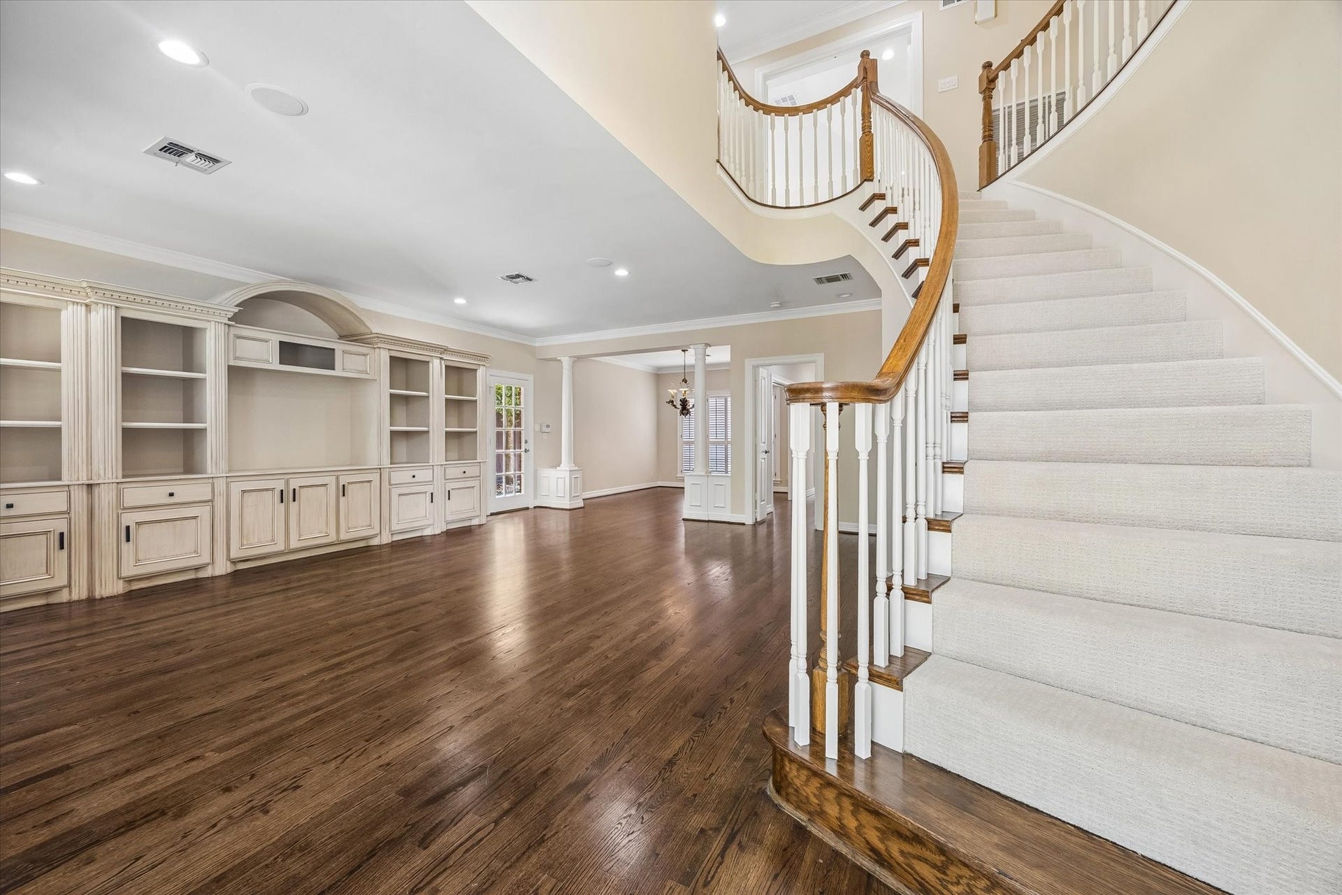 1613 Norfolk Street, Houston, TX 77006 Staircase with view of Family Room