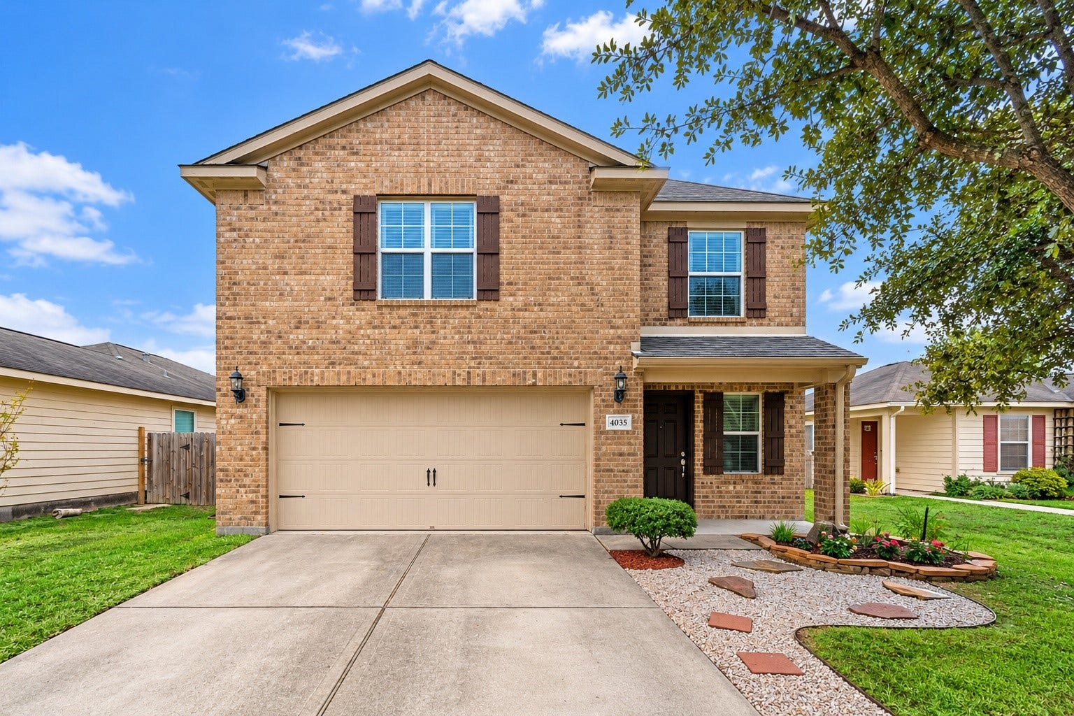 4035 Pedernales River Lane, Spring, TX 77386 Welcome home! This exterior photo has been virtually enhanced to showcase the homes curb appeal and provide a clearer view of the property. The tree canopy has been digitally trimmed back for visibility; no structural features of the home have been altered.