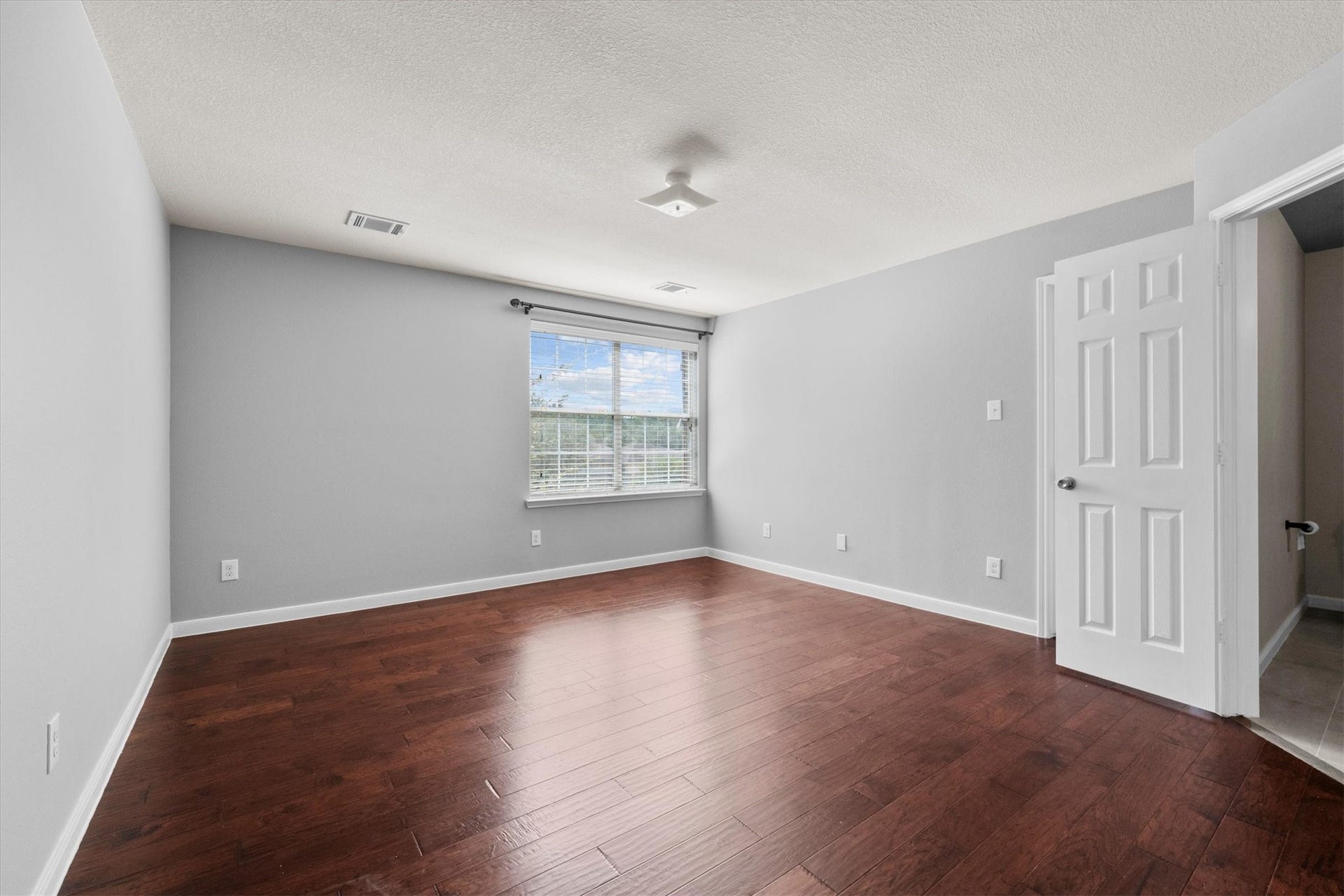 4035 Pedernales River Lane, Spring, TX 77386 Spacious primary bedroom with plenty of room to relax and unwind.