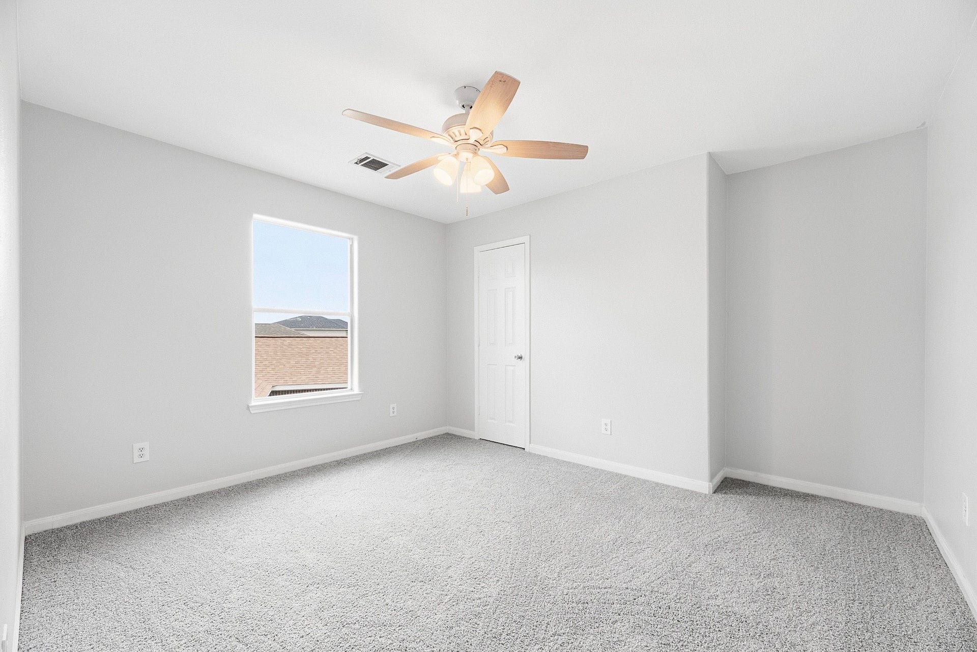28838 Frio River Loop, Spring, TX 77386 Neutral bedroom features carpeting, a ceiling fan, and a recessed corner beside the closet.