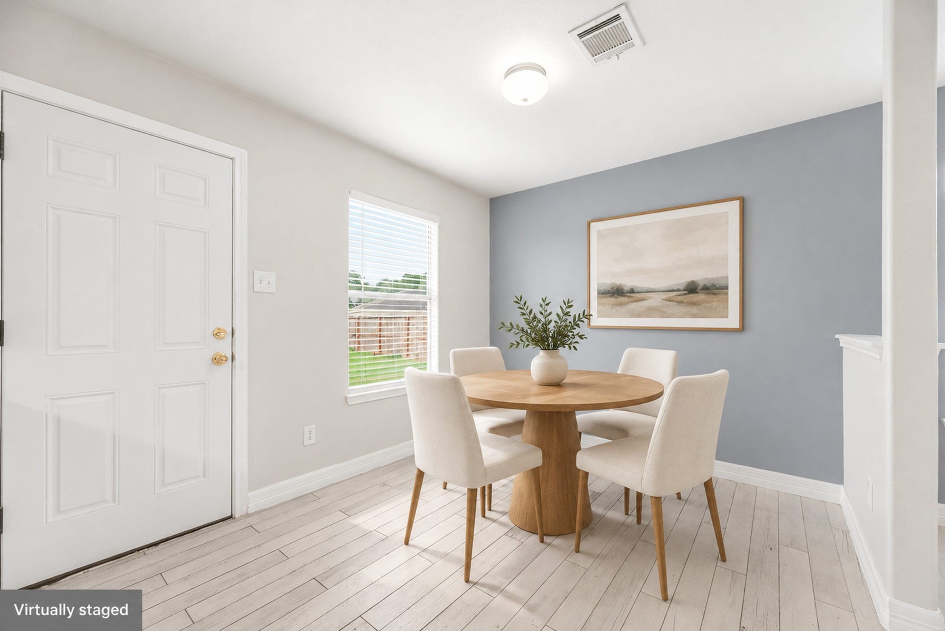 28838 Frio River Loop, Spring, TX 77386 Windowed breakfast area offers a defined dining space beside the kitchen and backyard door. (Virtually staged)